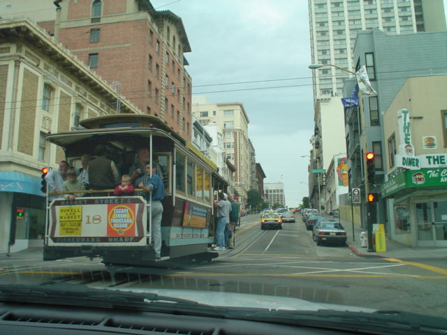 a cable car, viewed from passing traffic